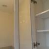 Interior of white bathroom cabinet