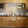 Oak flat panel doors and drawers with walnut pegs