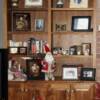 Natural walnut bookcase with raised panel doors on bottom